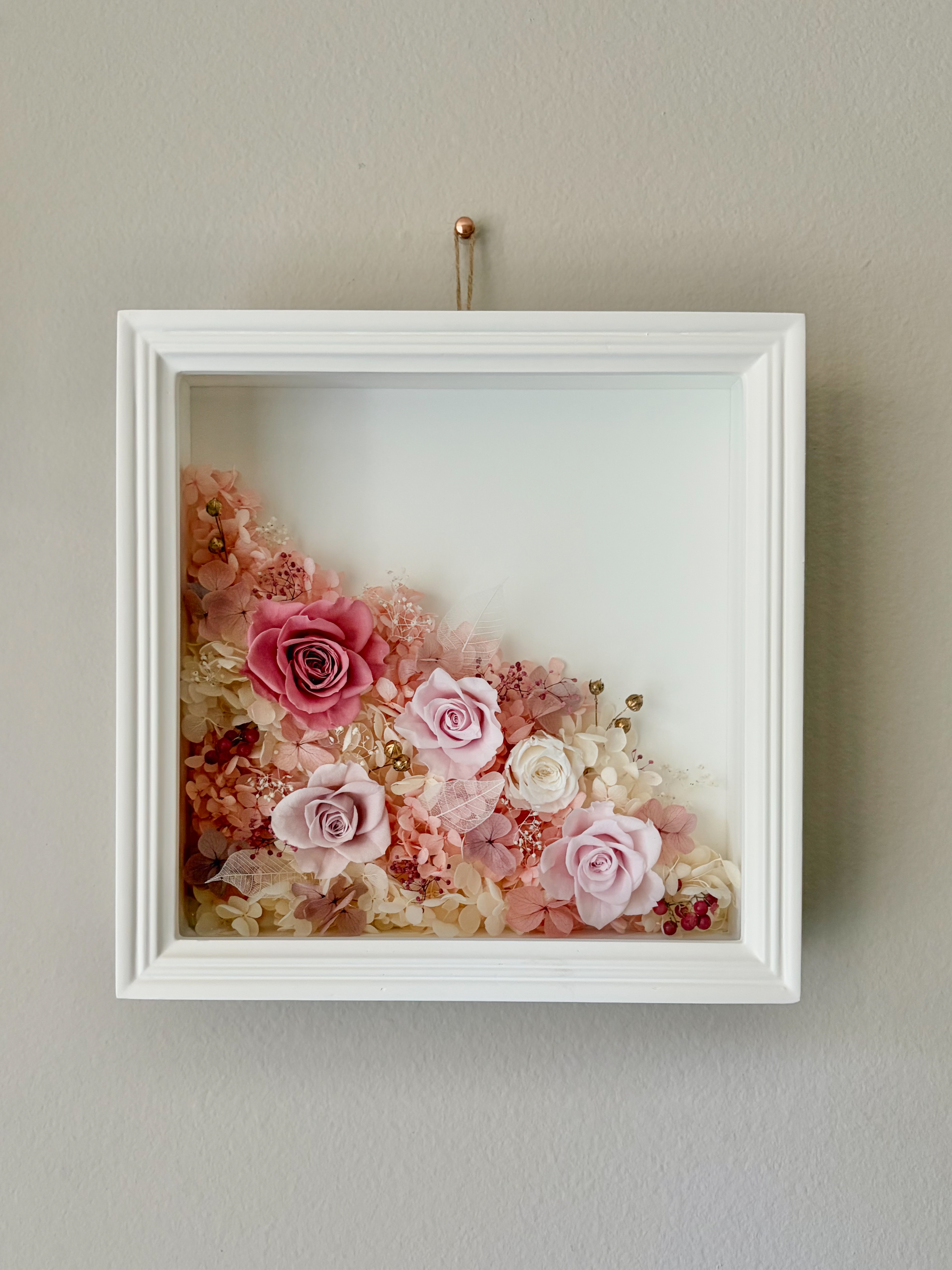 Framed preserved floral artwork